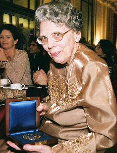 Barbara Mueller shows her award